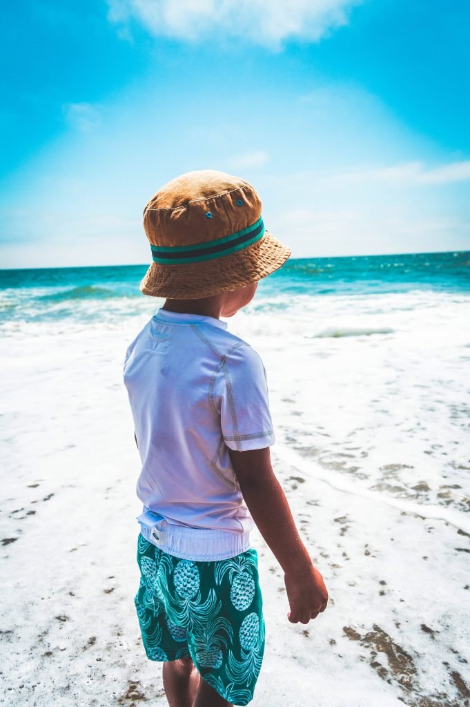 Kid splashing at the beach